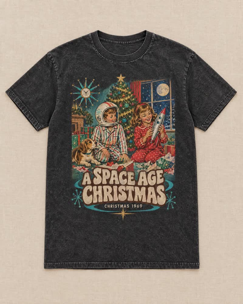 The A Space Age Christmas shirt in Midnight: The year men walked on the moon, every kid on the block wanted a rocket. You wore the helmet to Christmas dinner.