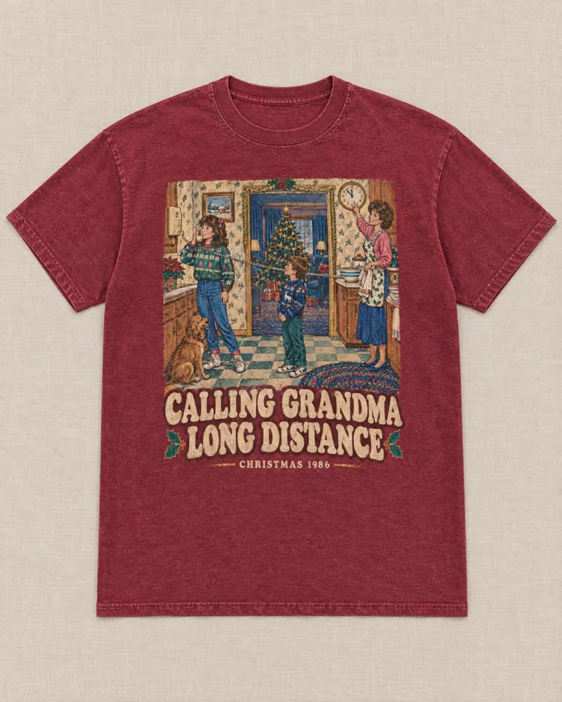 The Calling Grandma Long Distance shirt in Cranberry: Everybody got two minutes on the phone with Grandma, because it was long distance. Mom stood by the clock the whole time.