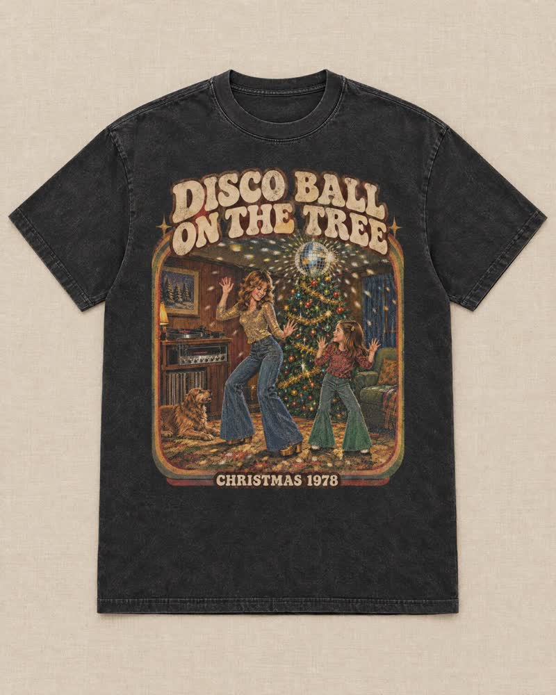 The Disco Ball on the Tree shirt in Midnight: Your big sister hung a disco ball on the tree and turned the living room into a dance floor. Mom pretended not to love it.