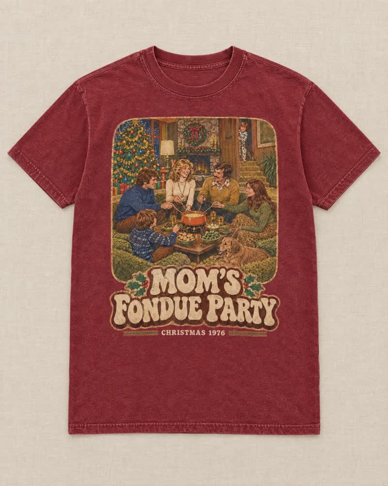 The Mom’s Fondue Party shirt in Cranberry: The orange fondue pot came out of the cupboard once a year. The grown-ups dipped bread till midnight and you watched from the stairs.