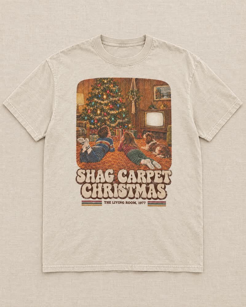 The Shag Carpet Christmas shirt in Candlelight: Lying on your belly in the shag, looking straight up through the branches at the big colored bulbs. The carpet still had tinsel in it in March.