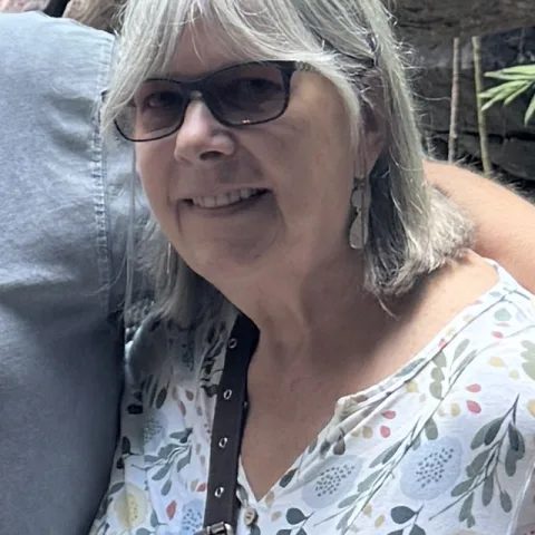 Andy’s mom, smiling in sunglasses